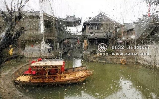 雨中的<a href='https://www.0632jj.cn/' target='_blank'><u>台儿庄古城</u></a> 别样的旅游体验